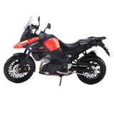 Model motorcycle with red and black design on a white background